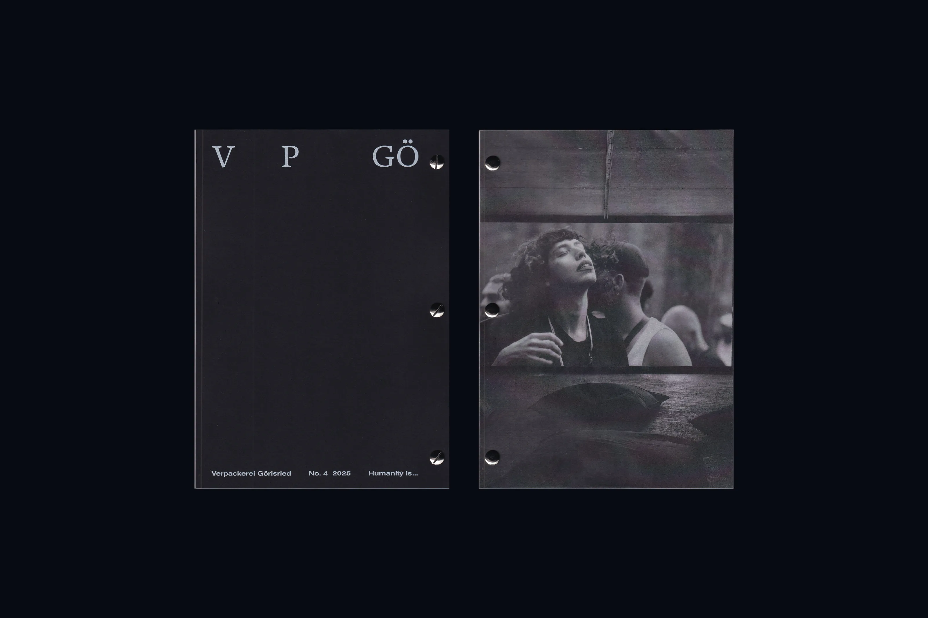 Catalog cover with a woman printed on transparent paper, next to the black back cover with V P GÖ in white