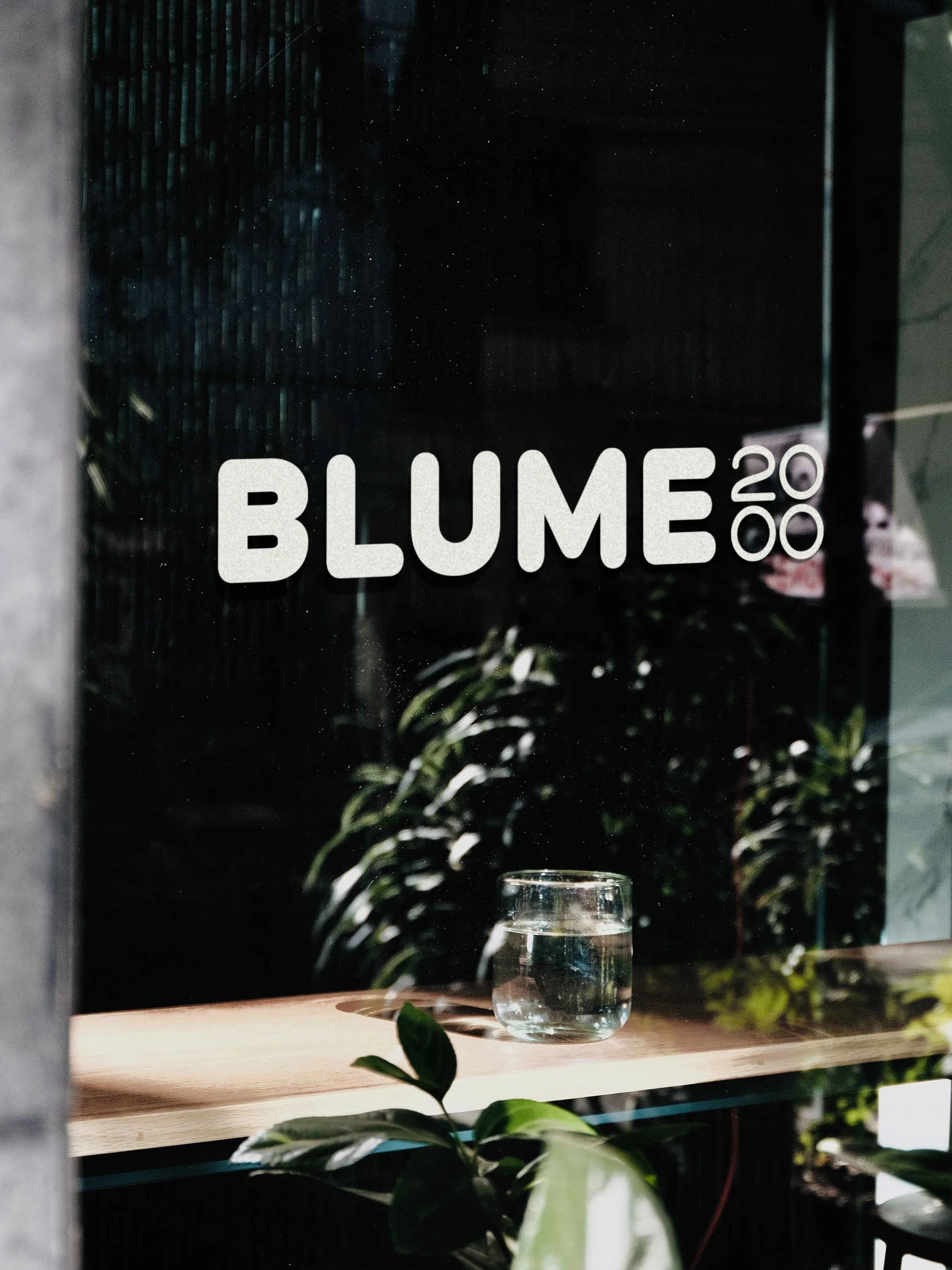 Blume2000 wordmark on a shop window