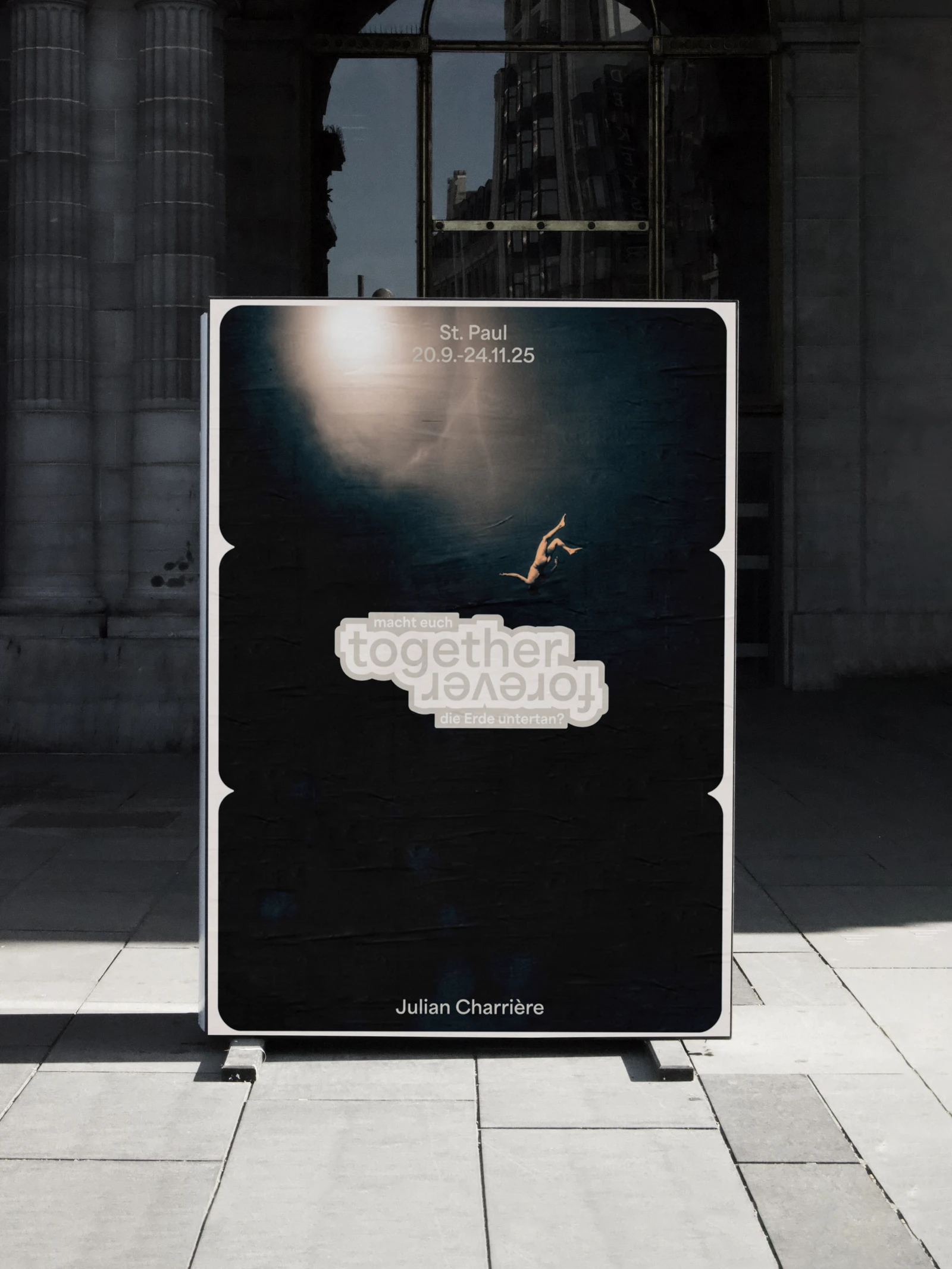 Together Forever poster with a night sky in a city display case