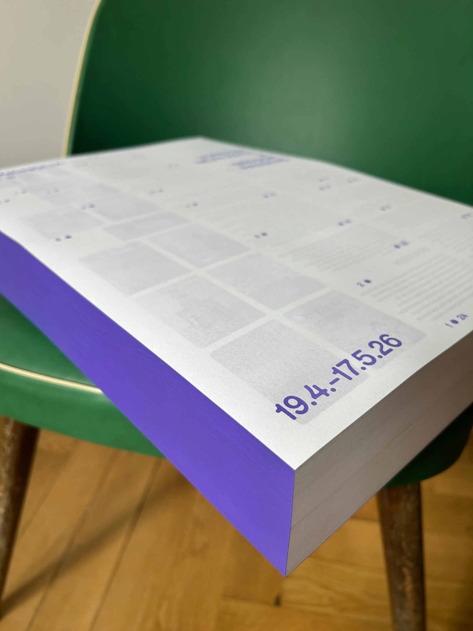 Close-up of the sheet stack with its purple edge and the dates 19.4.–17.5.26