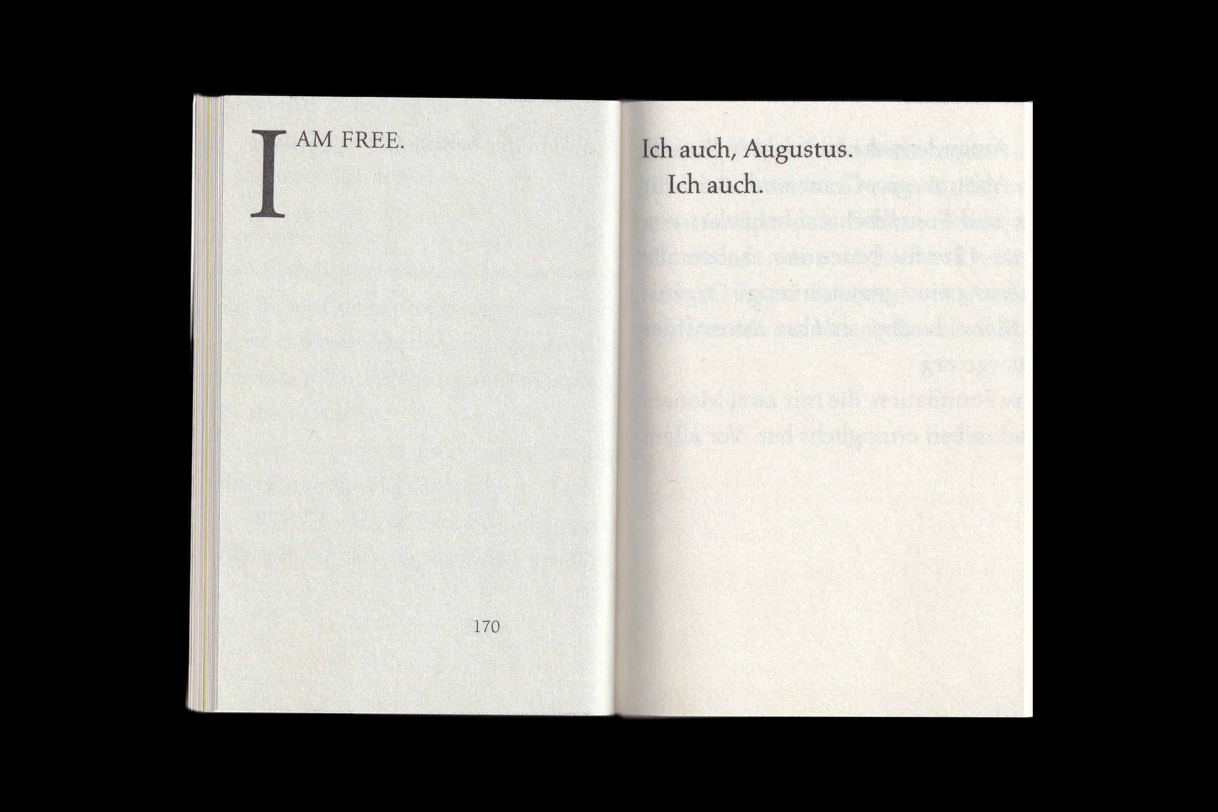 Scan of the words "I am free." and "Ich auch, Augustus. Ich auch."