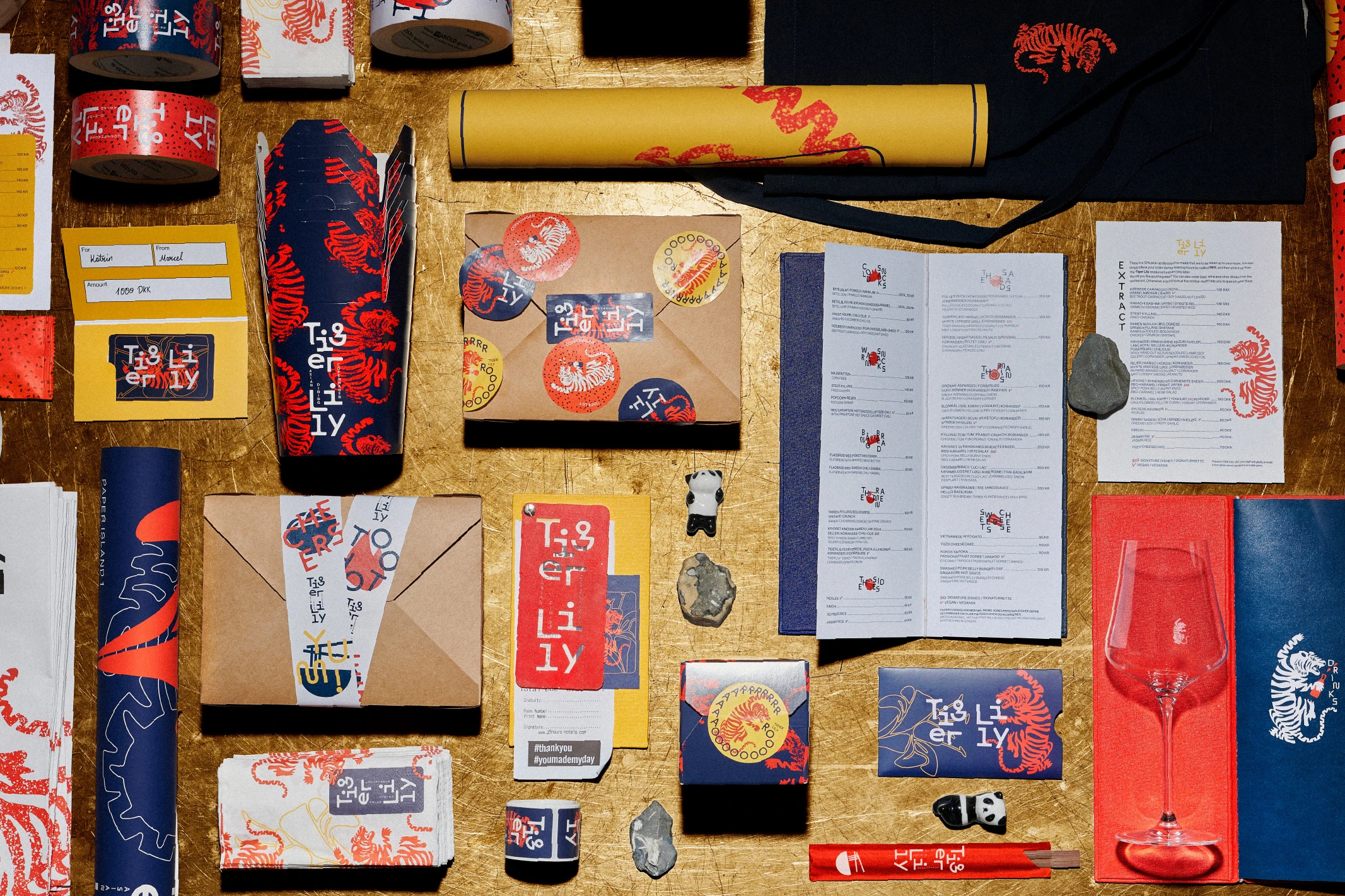 Overview of the Tiger Lily packaging, menus and stationery