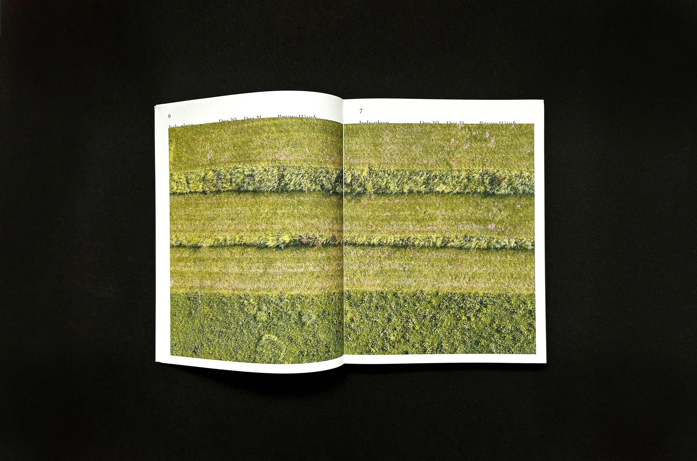 Catalog spread with an aerial photo of green fields
